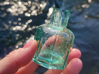 A penny ink bottle straight from the water © Jane Eastman