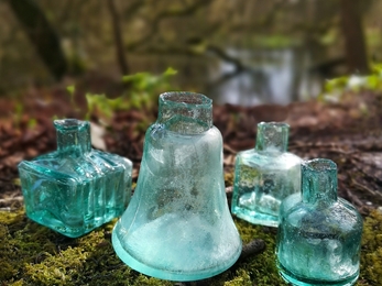 River found penny ink bottles and a penny lamp © Jane Eastman