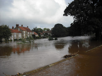 Photos of the village of Sinnington on the River Seven in Yorkshire during flooding in 2008