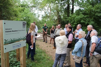 Group at the entrance to Fishlake Meadows nature reserve