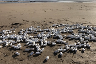 Otrivin bottles on beach