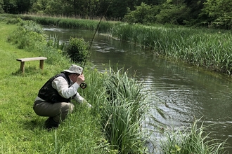 Martin Miles fishing in a chalk stream © Martin Miles