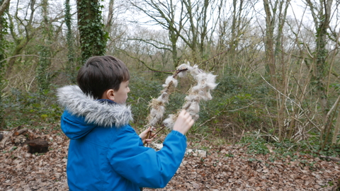 Boy making a bird nesting ring at Wildlife Rangers