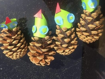 Pine cone crafts - with paper heads 