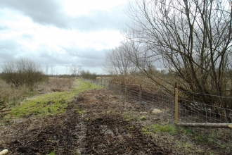 New fencing on the north-south path at Fishlake Meadows