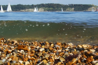 Sea at pebbly beach © Sarah Rumble