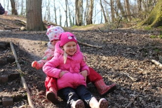 Children on a mud slide, Redlands Year R group at a Forest School session at Swanwick Lakes Nature Reserve on 17th March 2016