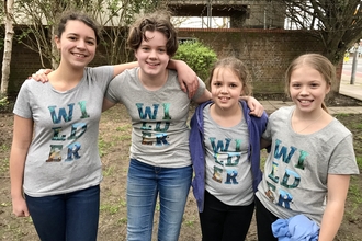 Friends Eve, Lucy, Robyn, and Coco celebrate planting at Frances Annie Place