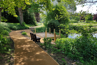 New path, bench and platform at Millennium Green Pond © HIWWT 