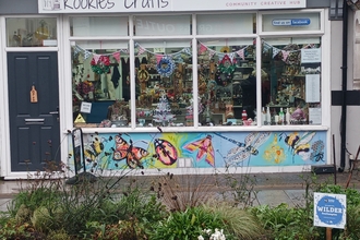 Local artist Joanna Rose Tidey mural on the bottom panel of Kookies Crafts
