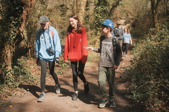 Wildlife Rangers walking along a path