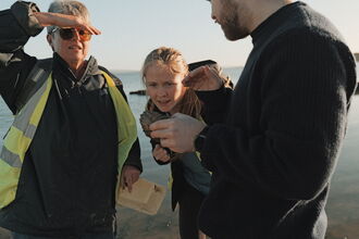 3 marine champions ID marine species on survey