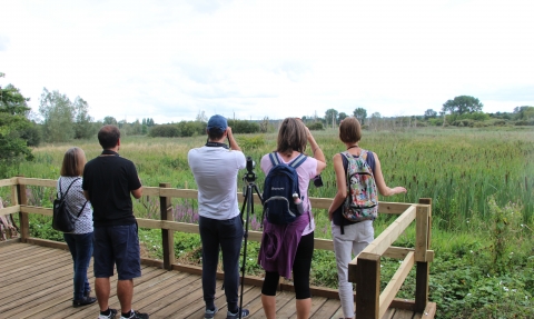 Visitors observing an osprey from the new platforms at Fishlake Meadows Nature Reserve