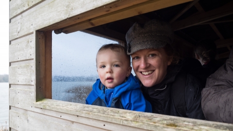 Mum and tot in the bird hide at Blashford Lakes nature reserve