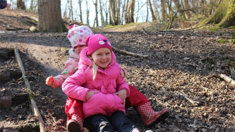 Children on a mud slide, Redlands Year R group at a Forest School session at Swanwick Lakes Nature Reserve on 17th March 2016