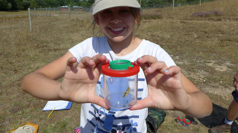 Mia with grasshopper