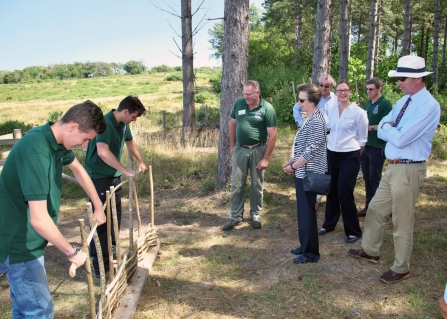 Princess Royal watching the Woodland Apprentices at work