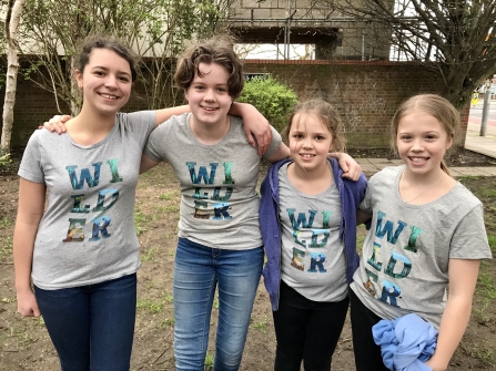 Friends Eve, Lucy, Robyn, and Coco celebrate planting at Frances Annie Place