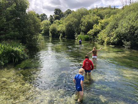 People paddling in the River Arle © Melanie Hill