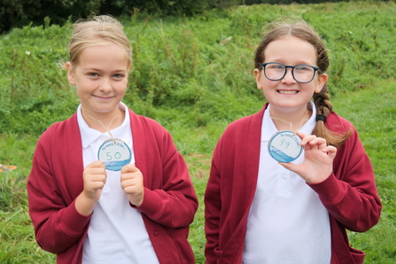Whitchurch School pupils with badges - 'how old will you be in 2063?'