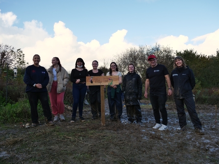 Princes Trust and HIWWT staff group photo in front of pond