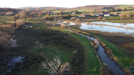 Drone footage of river and floodplain. 