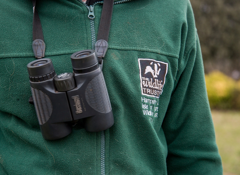 Trust staff with binoculars