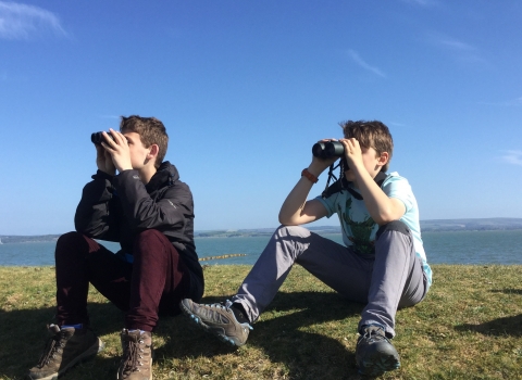 Young Naturalists watching avocets
