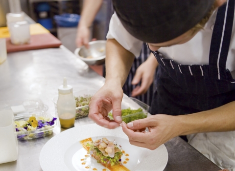 Chef preparing seafood © Toby Roxburgh/2020 VISION