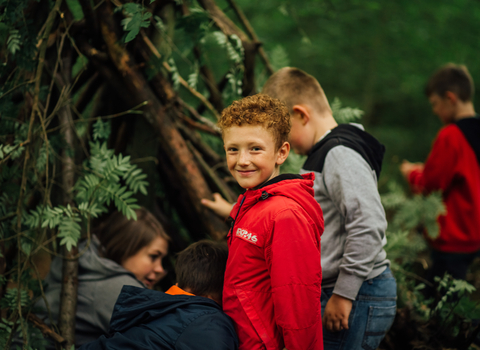 children building den