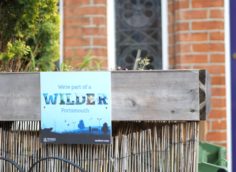 Wilder portsmouth plaque on bin shed