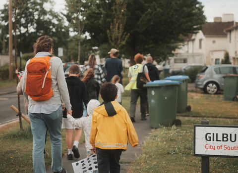 Wilder Mansbridge tree trail - people walking down residential street